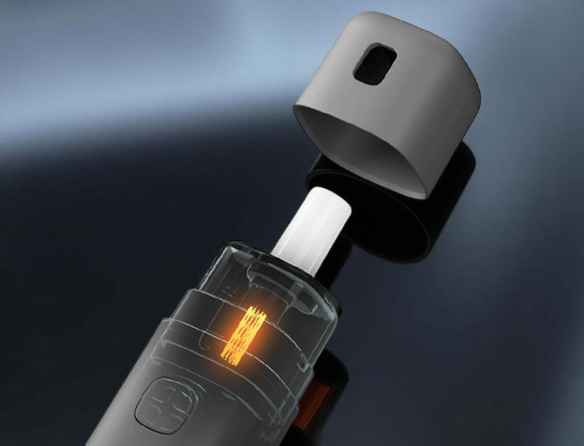 The Eleaf IORE Crayon with its protective cap removed, showing the internal 0.8Ω mesh coil glowing to highlight the heating element's large surface area