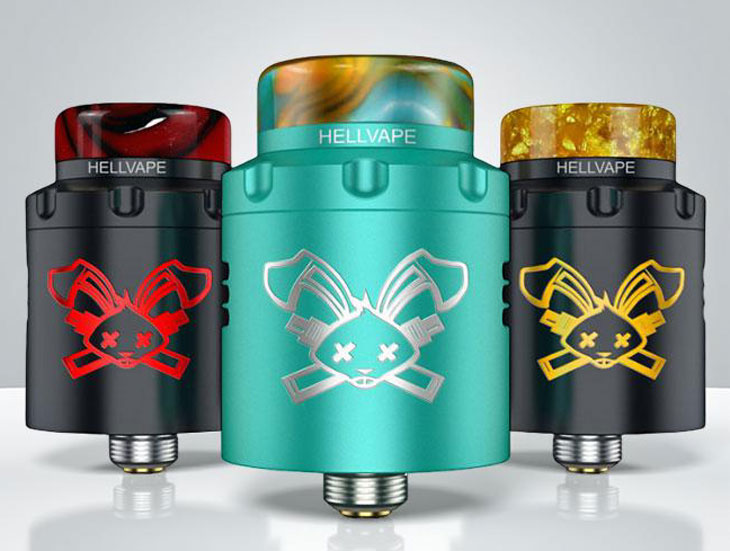 Side-by-side display of the Hellvape Dead Rabbit 3 RDA in three distinct colorways: Black/Red, Turquoise, and Black/Gold. The image highlights the detailed top cap engraving, stainless steel construction, and the wide-bore 810 resin drip tip.