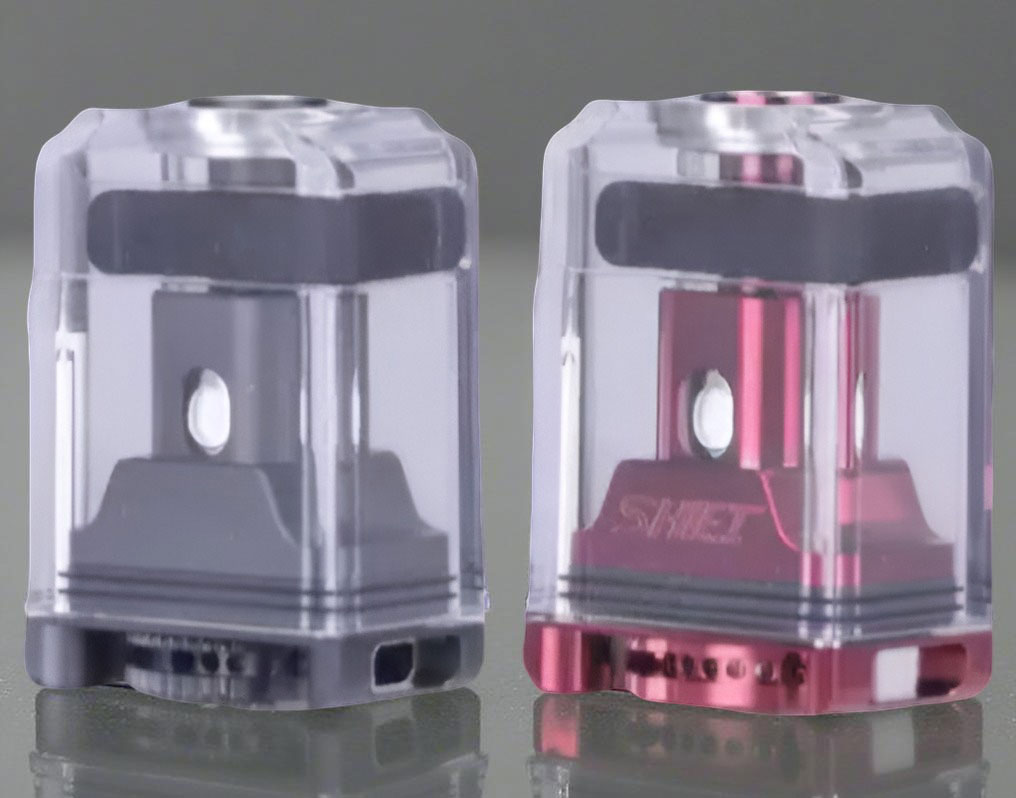 Two transparent Shift Boro Tanks displayed together; the left version features a black internal chimney and base, while the right version is accented with a vibrant red internal chimney and base.