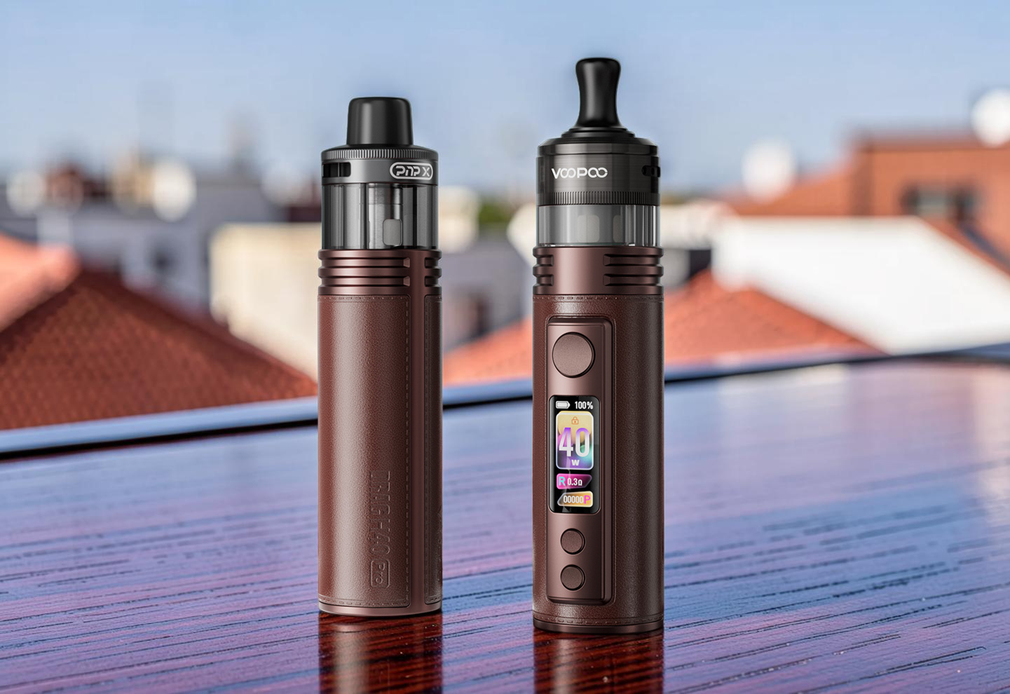 Front and back view of the cylindrical Voopoo Drag H40 Pro vape kit in Cocoa Red. The front side displays a vibrant 0.72-inch TFT screen reading 40W for precise power monitoring, while the premium leather back panels showcase the ergonomic design built for superior grip comfort.